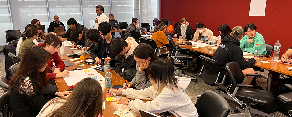 Groups of people at the First Annual Idea Hackathon