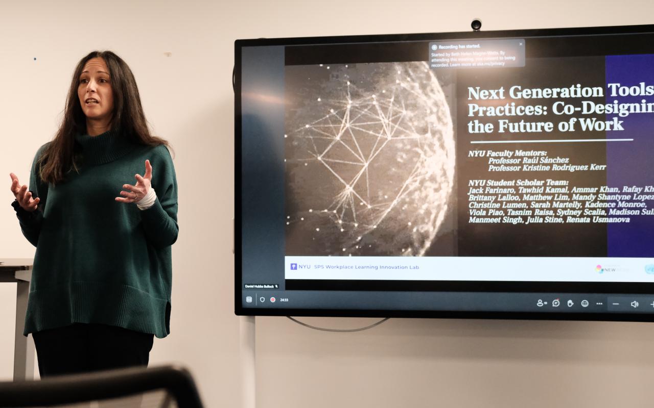 Director of the MSPW program Kristine Rodríguez Kerr presents to an audience.