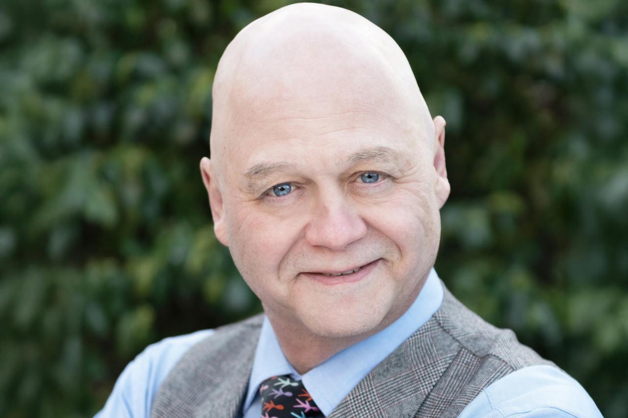 Headshot of Helio Fred Garcia.