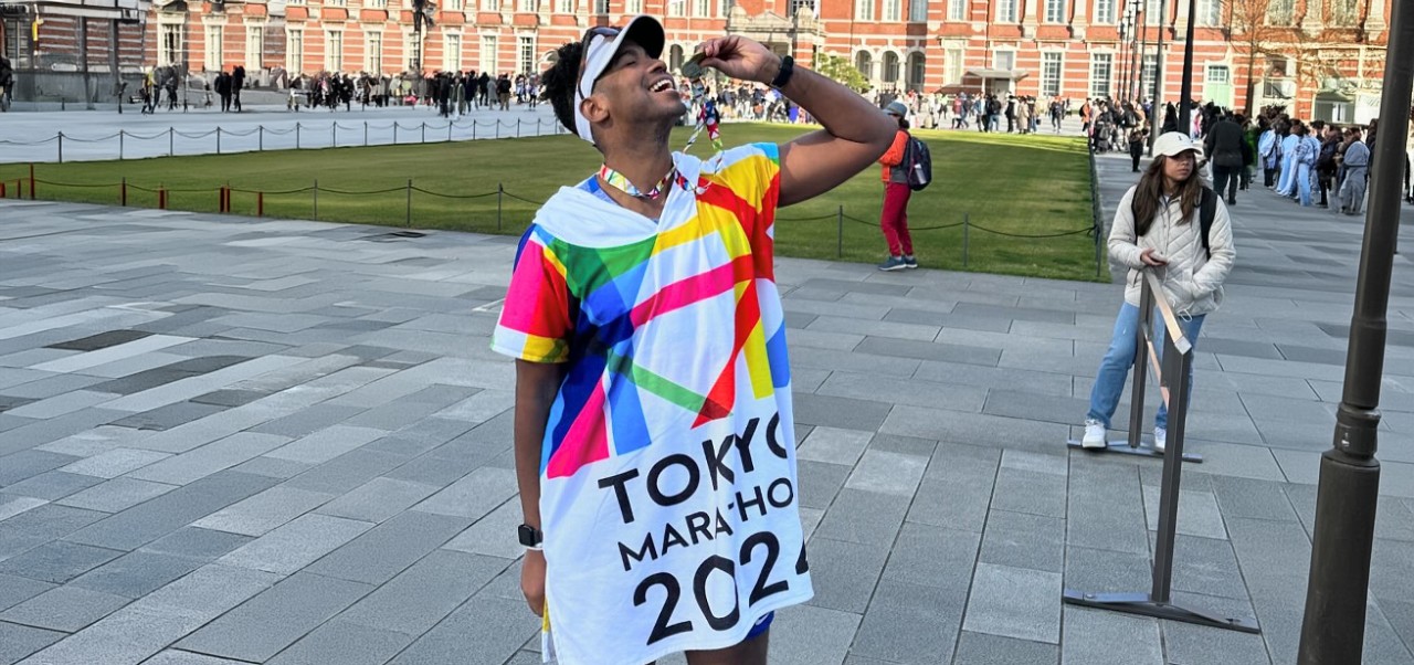 Jeremy Reese, NYU SPS Division of Programs in Business alumnus, revels in the joy of completing the Toyko Marathon.