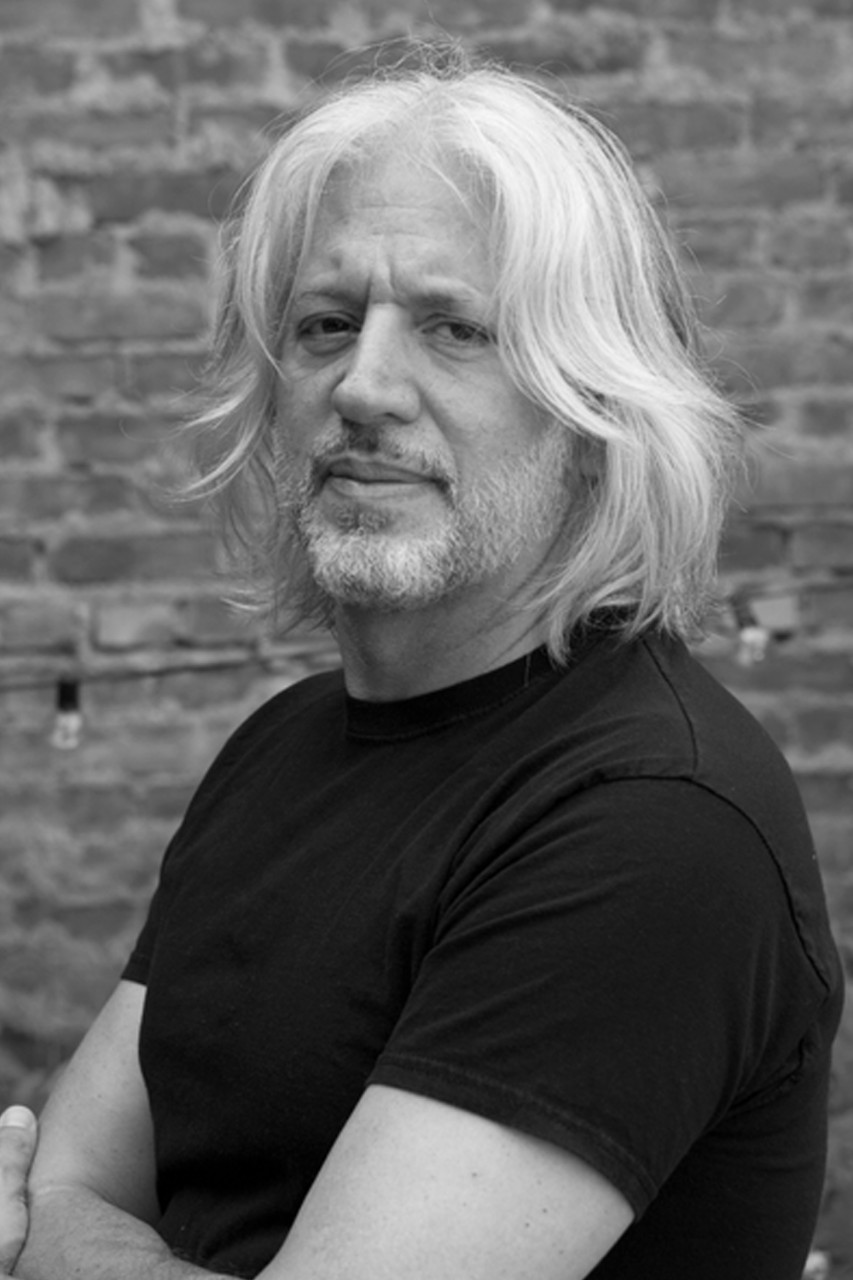 Headshot of David Hollander in a short sleeved shirt.