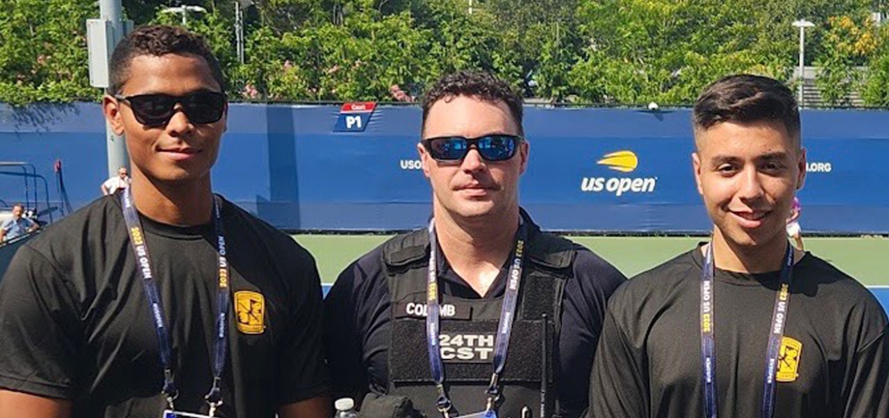 Maurice Moore, student at the NYU SPS Division of Applied Undergraduate Studies, pictured with colleagues in the armed forces.