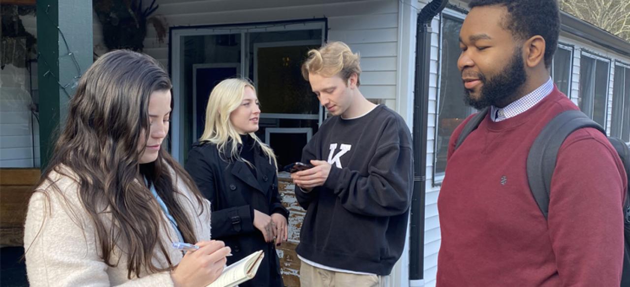 Two pairs of students engage in a Q&A during an applied learning session in Glen Falls.