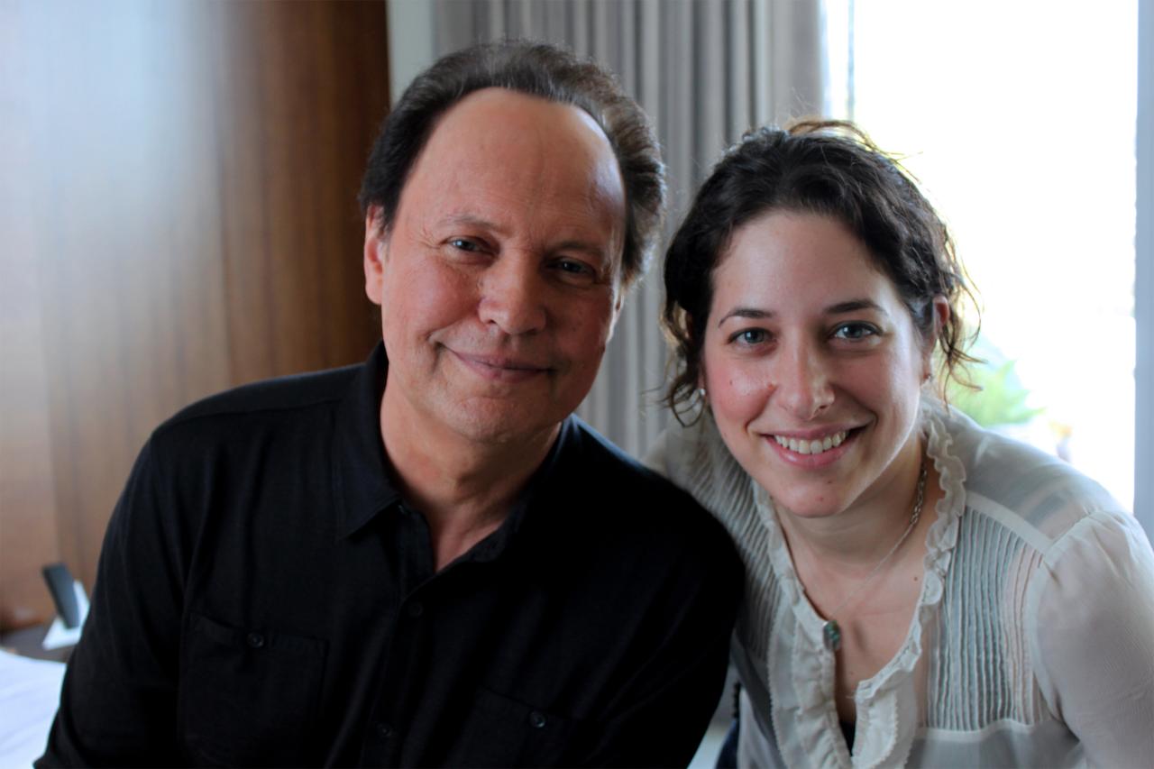 NYU SPS CE instructor Abby Russell smiles for a photo with Billy Crystal