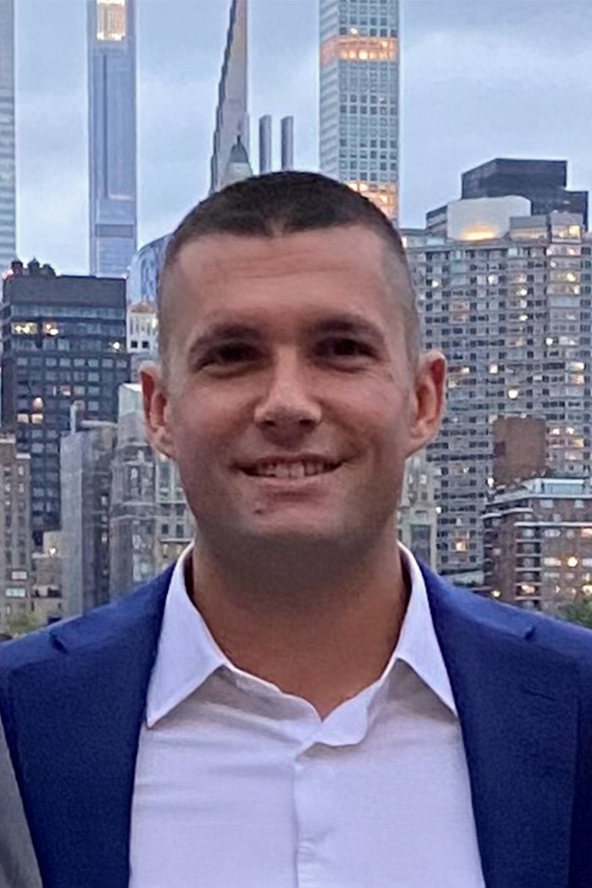 NYU SPS CE instructor Justin Redmond smiles for a photo