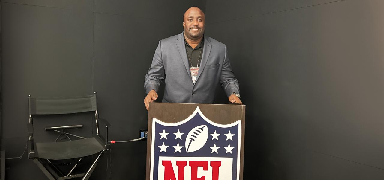 Daniel G Kelly II, Clinical Professor, Preston Robert Tisch Institute for Global Sport, NYU SPS, stands at an NFL-branded lectern.
