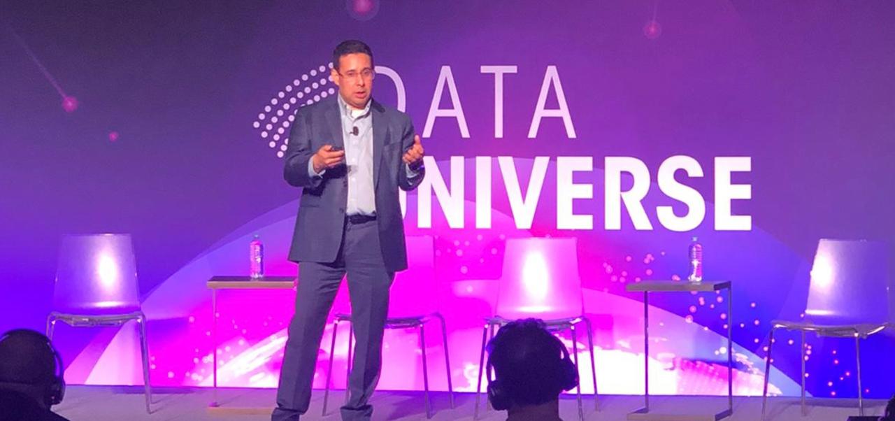 Jose R Mendoza. Clinical Associate Professor, Division of Programs in Business at NYU SPS, speaks on-stage at a Data Universe event.